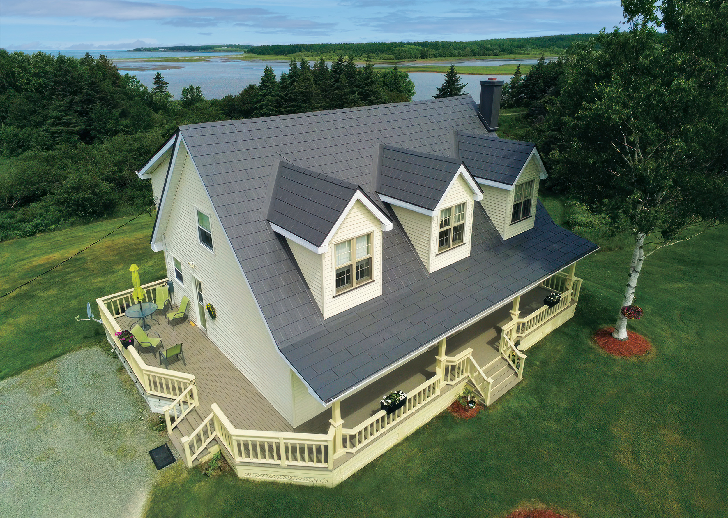 Wakefield Bridge steel roof in Granite Grey on a coastal-style home