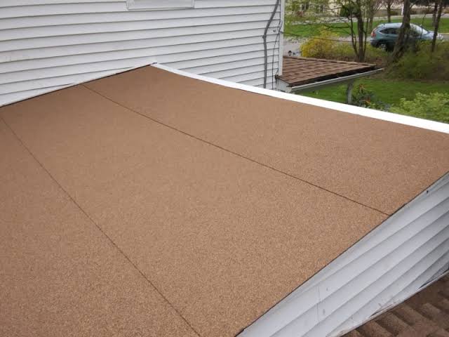 Layers and components used in a low-slope modified-bitumen roof assembly